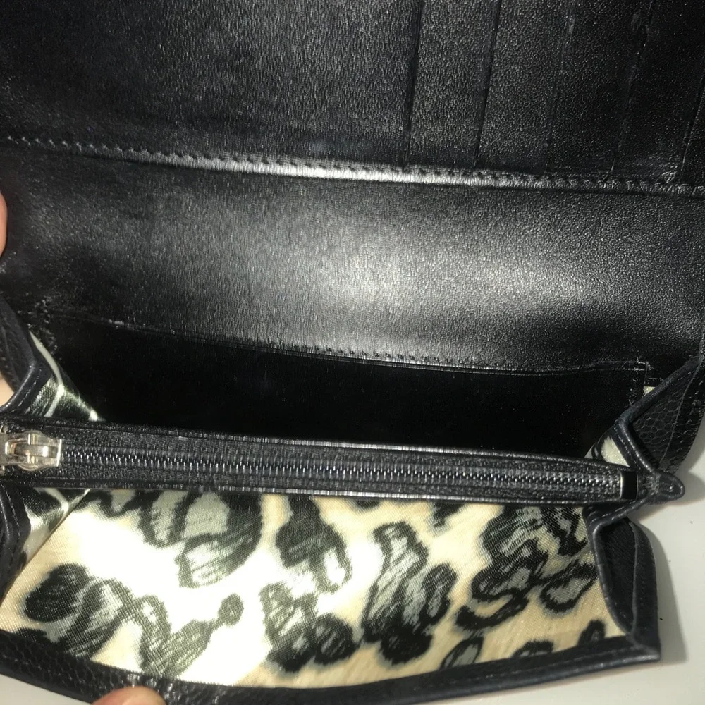 Longchamp black leather folding wallet‎